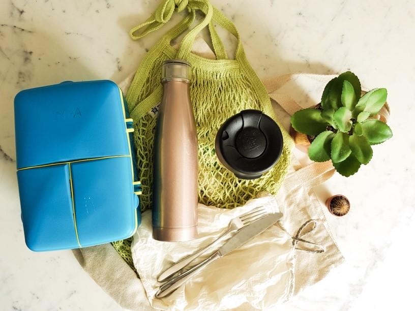 Flatlay of tote bag showing the reusable items which you can carry around everyday